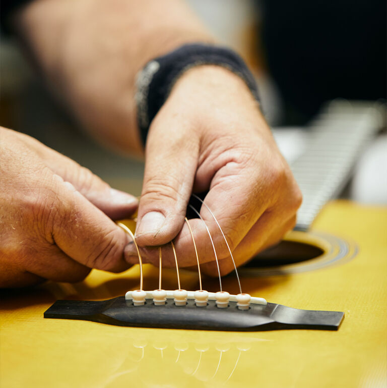 Open mics, check neck relief, change your strings
